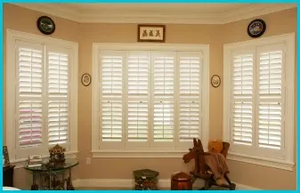 white painted atlantic wood shutters