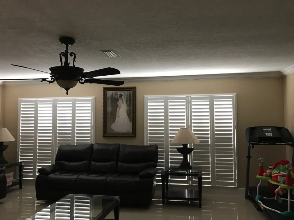 white islander pvc series shutters in the living room