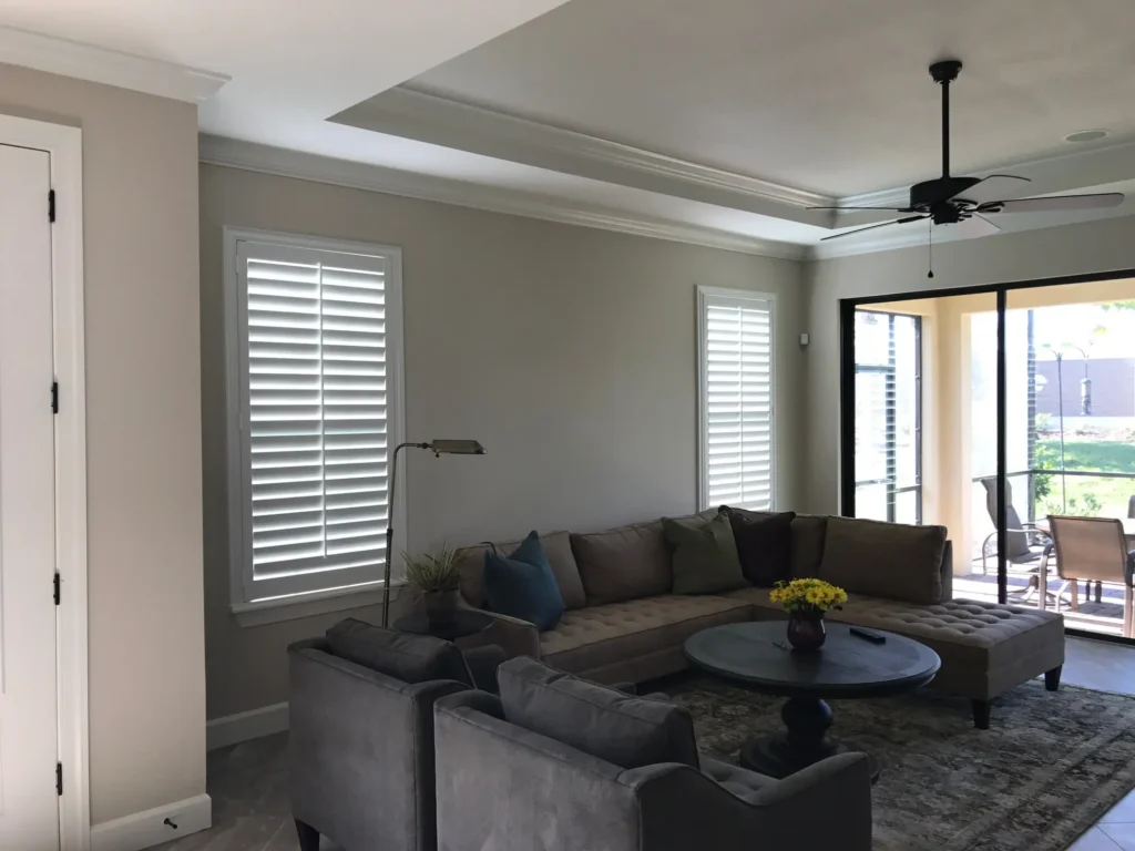 islander pvc series shutters in a living room