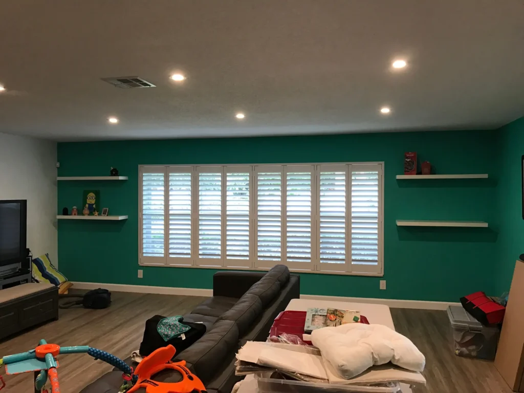 atlantic wood series painted shutters in lounge room