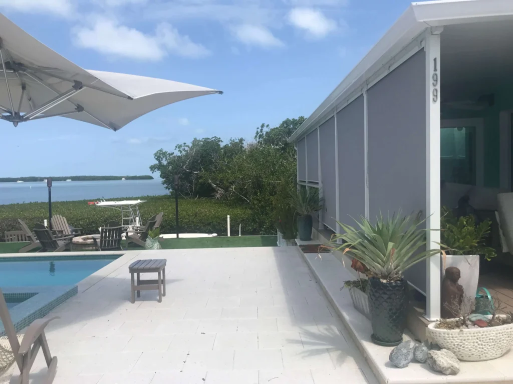 outdoor solar shades near a pool