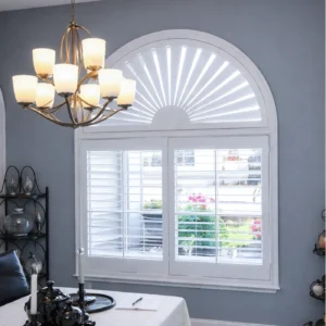 Front window after custom plantation shutters were installed by Nature Coast Shutters